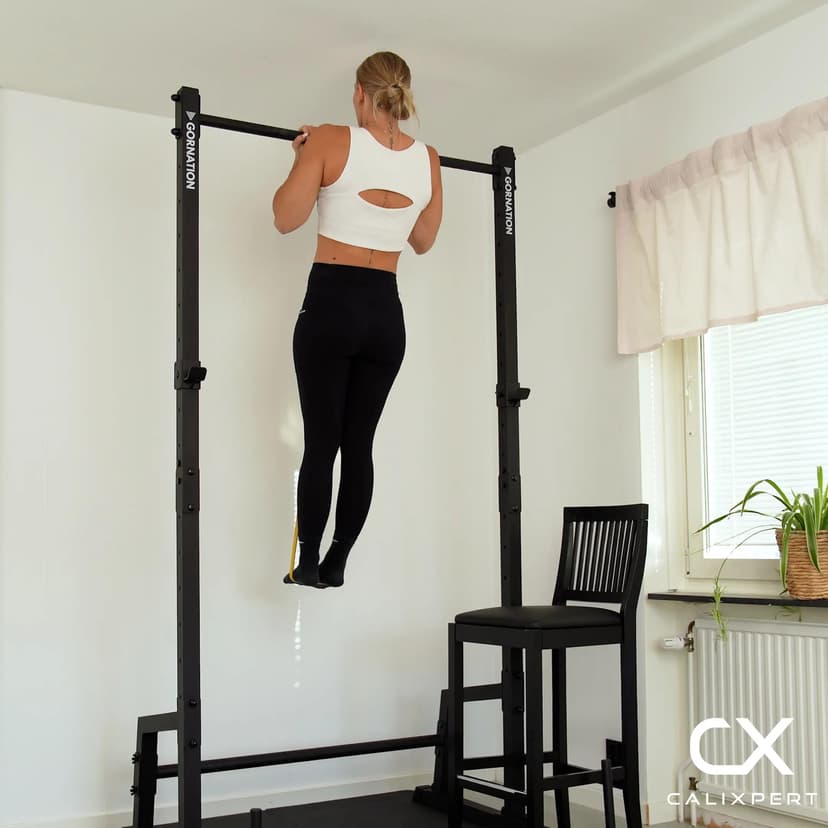 Bandassisterad chin-up-toppshållning